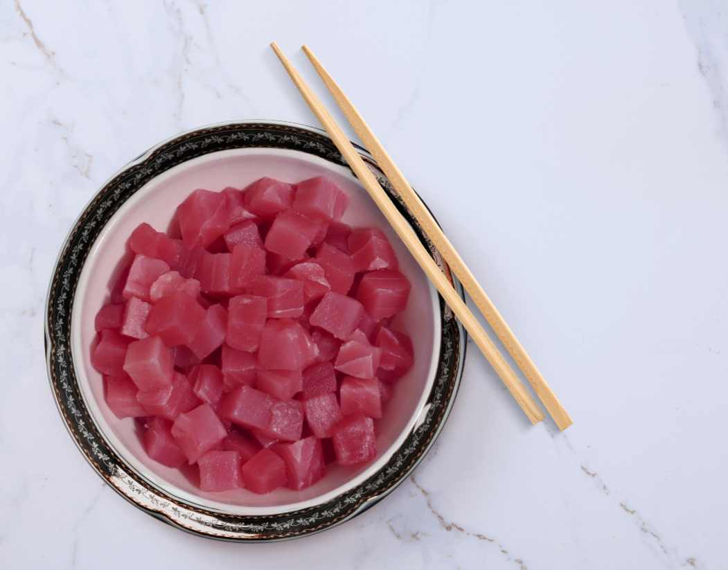 raw tuna poke cubes in a bowl