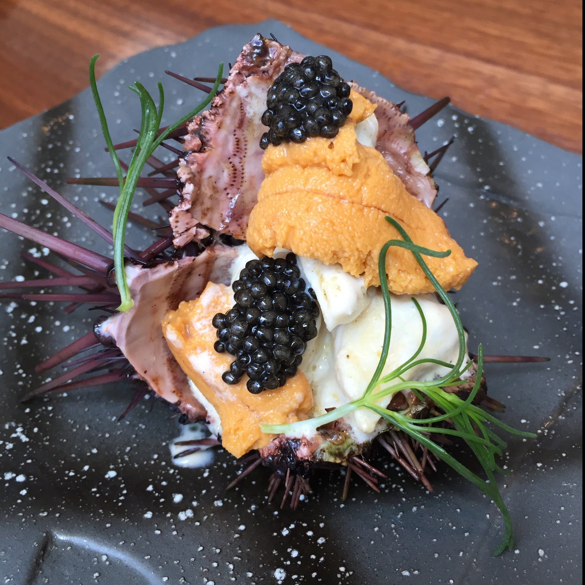Uni as an appetizer on an oyster with caviar